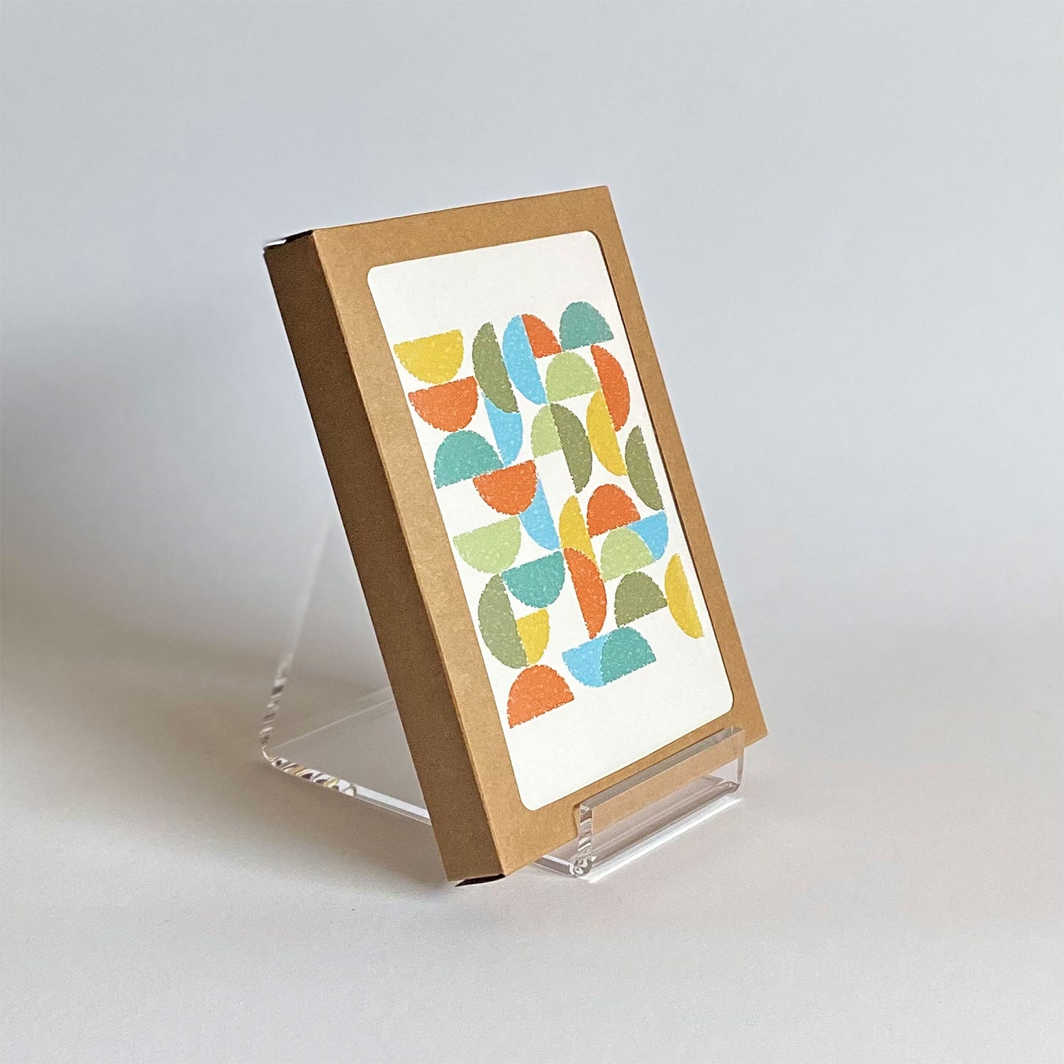 Productafbeelding, foto wenskaart "ronde kleuren naar terra" gepresenteerd in zijn 10-Pack verpakking