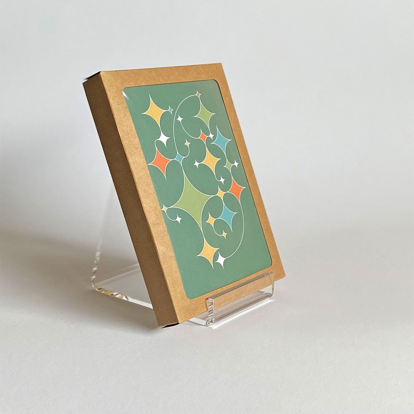 Productafbeelding, foto wenskaart "rising stars (donkergroen)" gepresenteerd in zijn 10-Pack verpakking