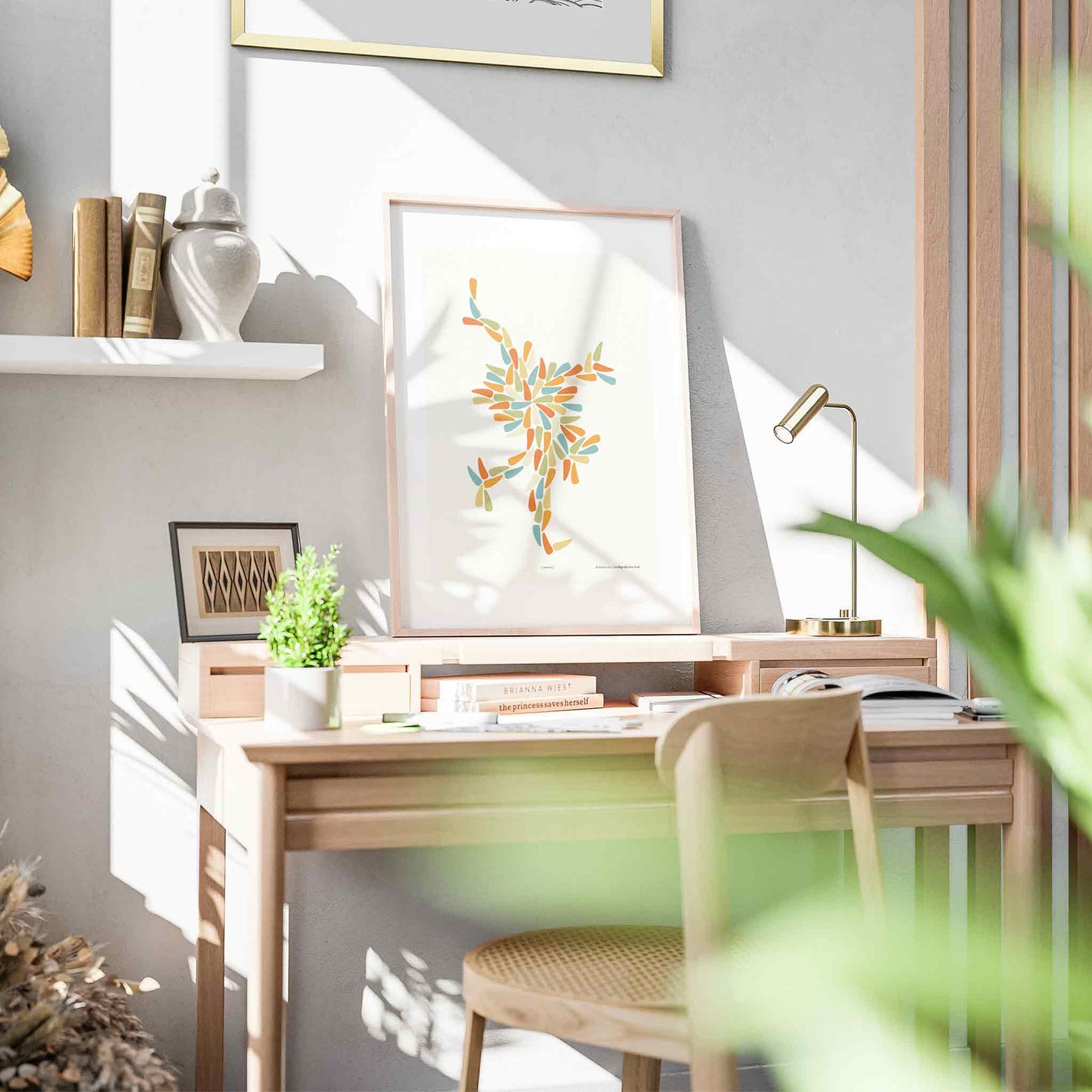 Productafbeelding, poster "dansia", foto impressie 3, staande op een bureau in een licht interieur