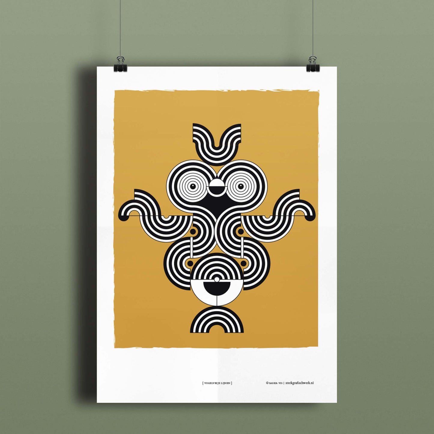 Productafbeelding, poster "vogelvrije lijnen", hangend aan een warm groen gekleurde wand, een overzichtsfoto