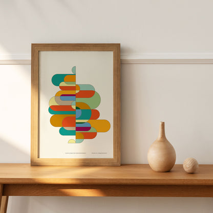 Productafbeelding, poster "kleur-acrobaat met ronde rechthoeken", foto impressie 1, staande op een side-table met een vaasje