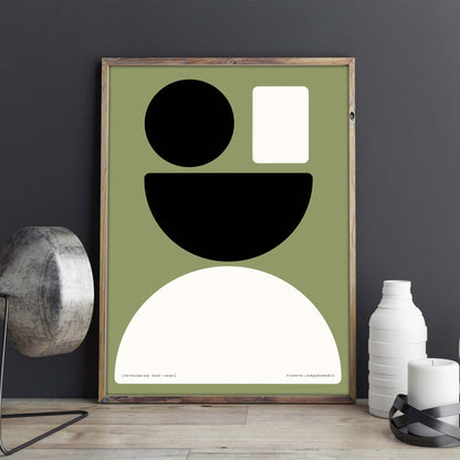 Productafbeelding, poster "een vrolijke som zwart+groen", foto impressie 2, ingelijst staande aan een wand met decoratieve elementen