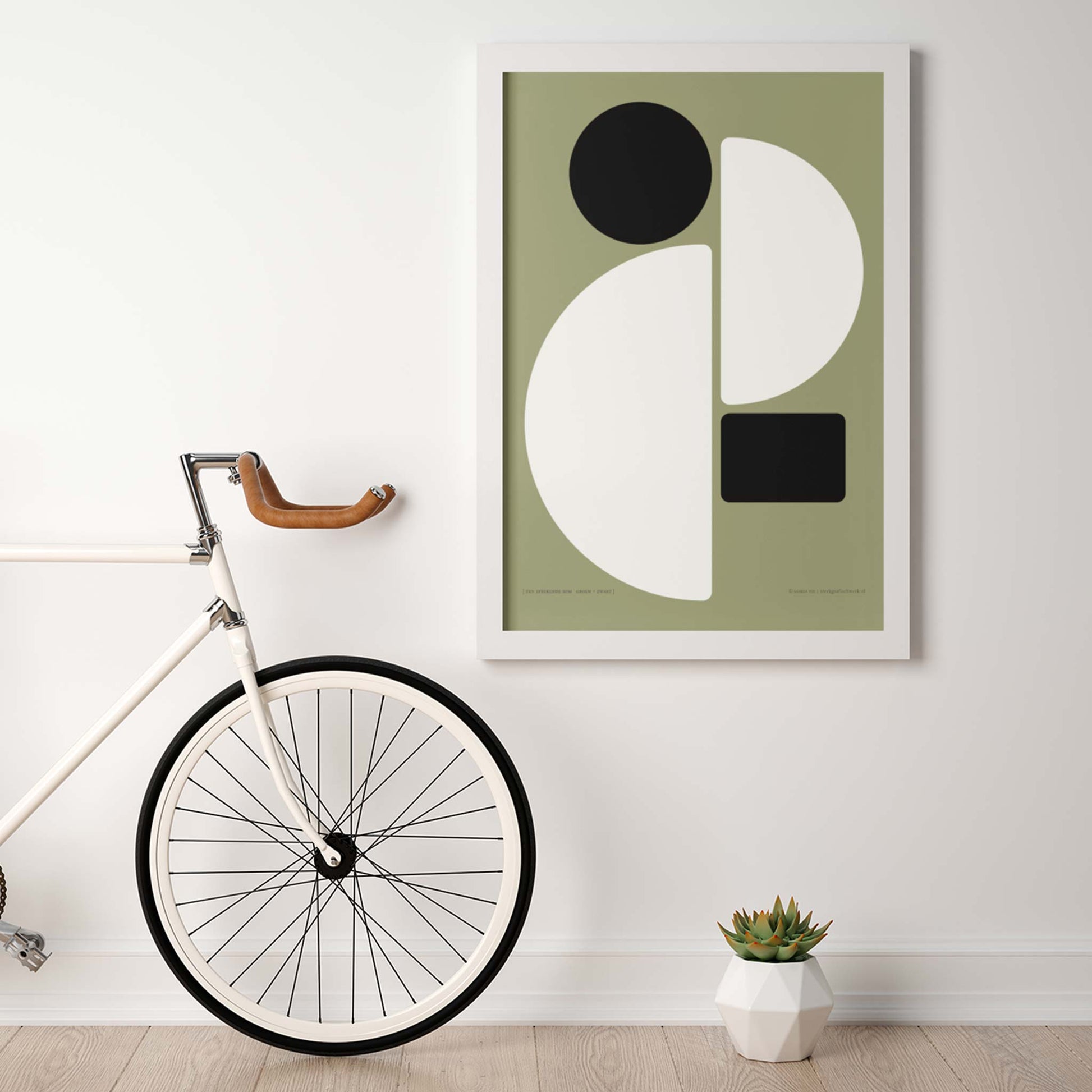Productafbeelding, poster "een sprekende som groen+zwart", foto impressie 2, hangend aan een wand, in een moderne inrichting