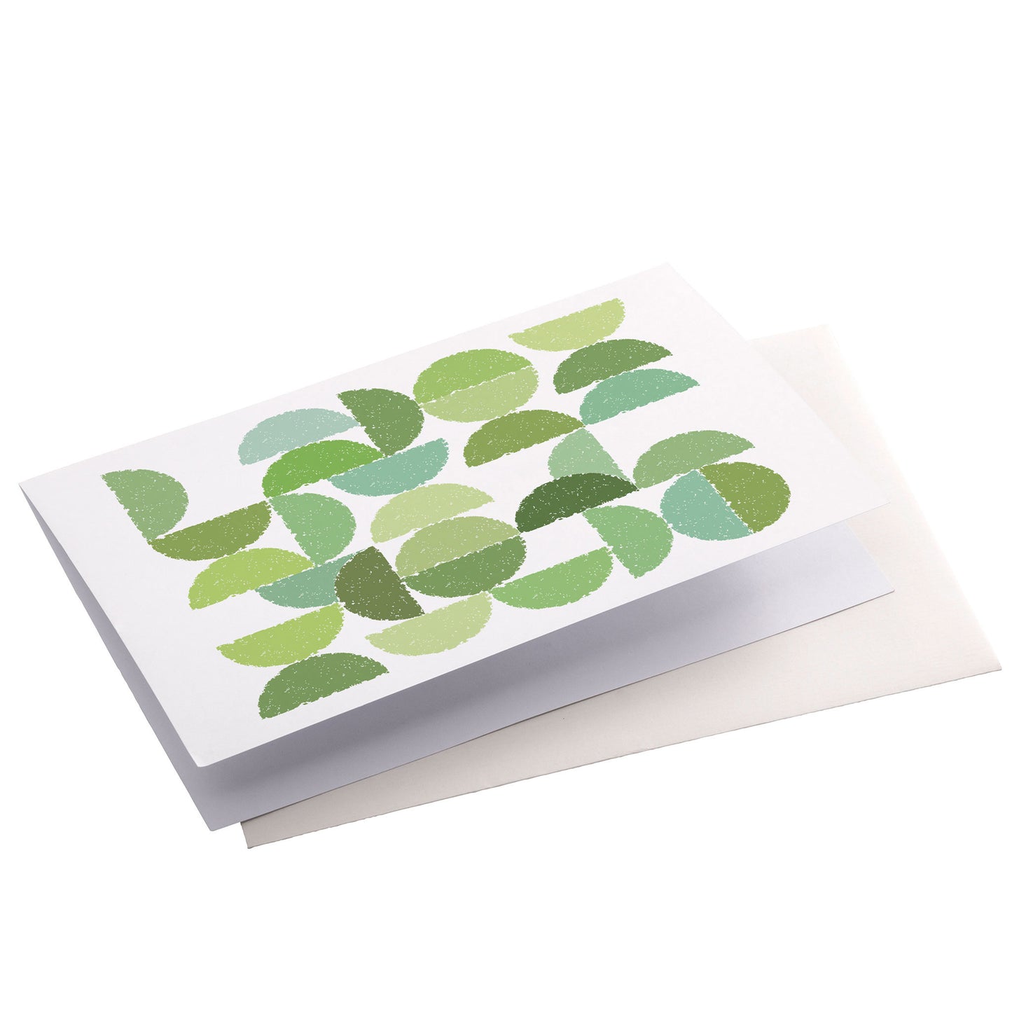 Productafbeelding, wenskaart "ronde kleuren naar bladgroen", zijaanzicht liggend met een envelop