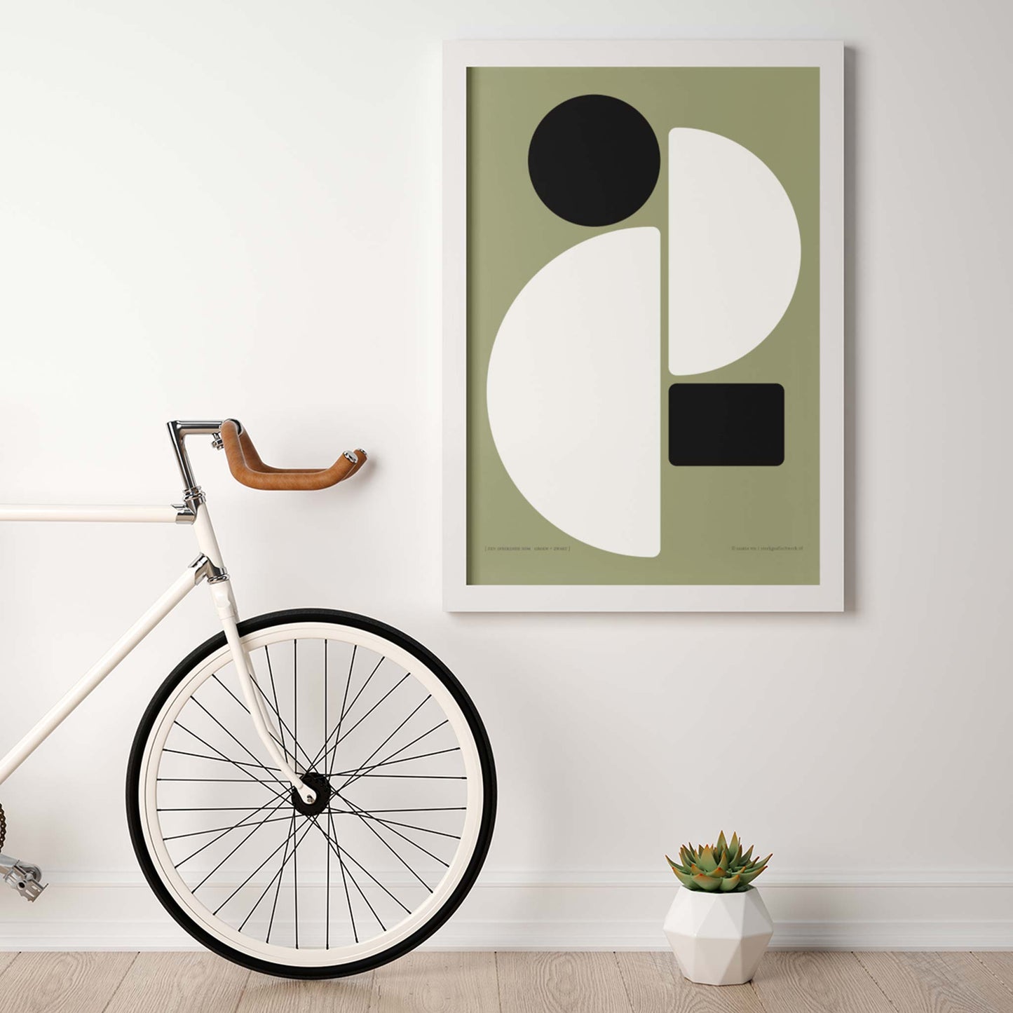 Productafbeelding poster "een sprekende som groen+zwart" 2de impressie hangend aan een wand in een interieur
